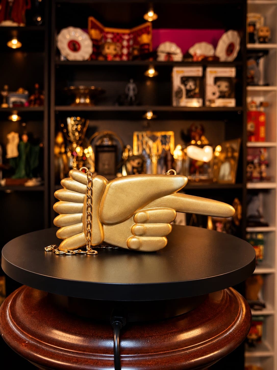 mano dorada de la libreria flourish y blotts figura coleccionable mundo magico