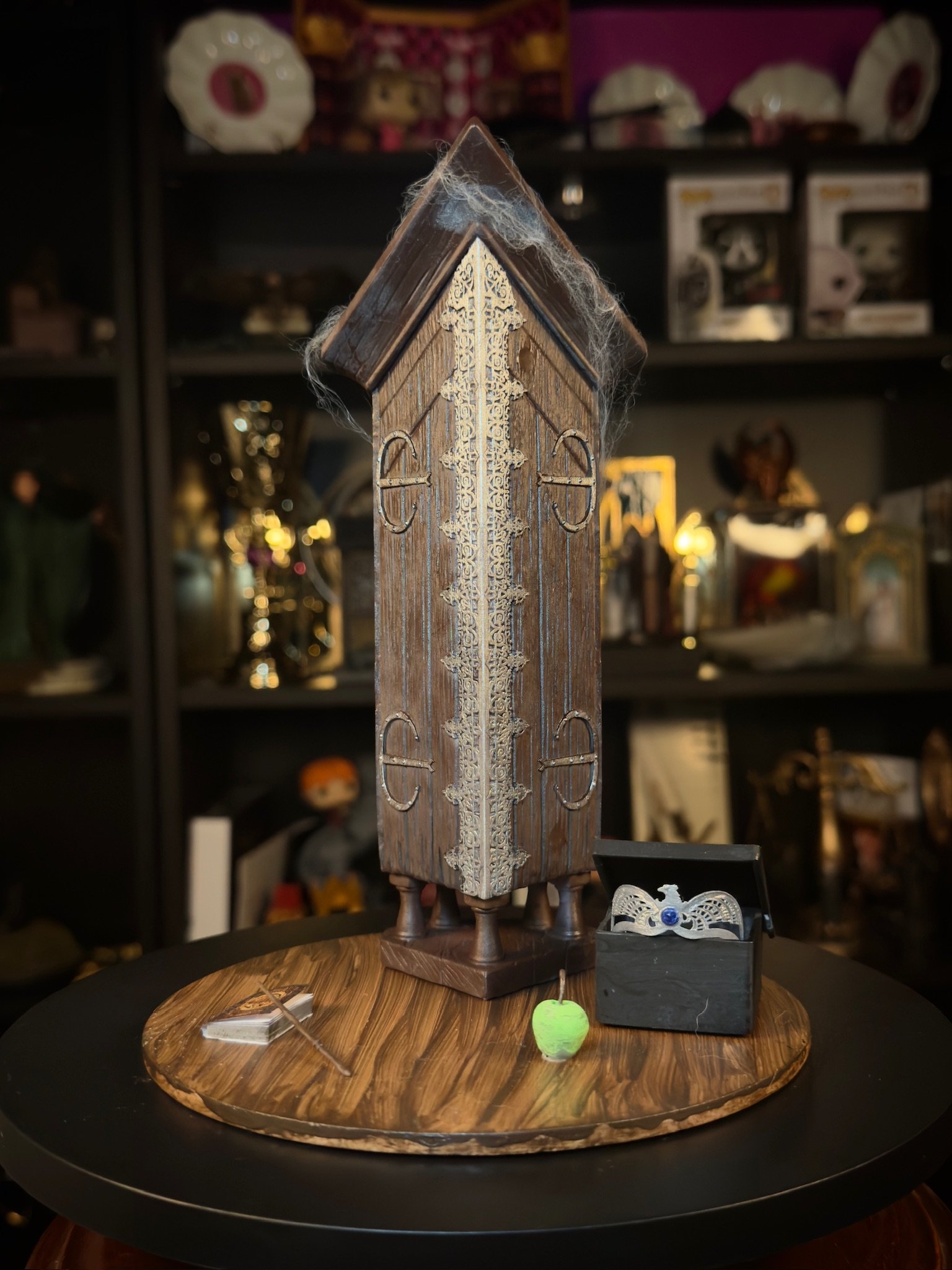 diorama del armario evanescente de Draco MAlfoy